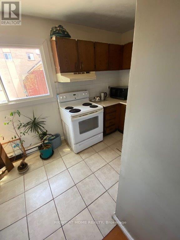 Property at 5 - 1209 QUEEN STREET E image 2