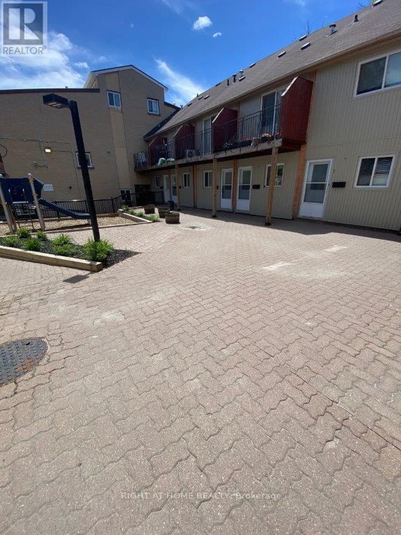 Property at 5 - 1209 QUEEN STREET E image 1