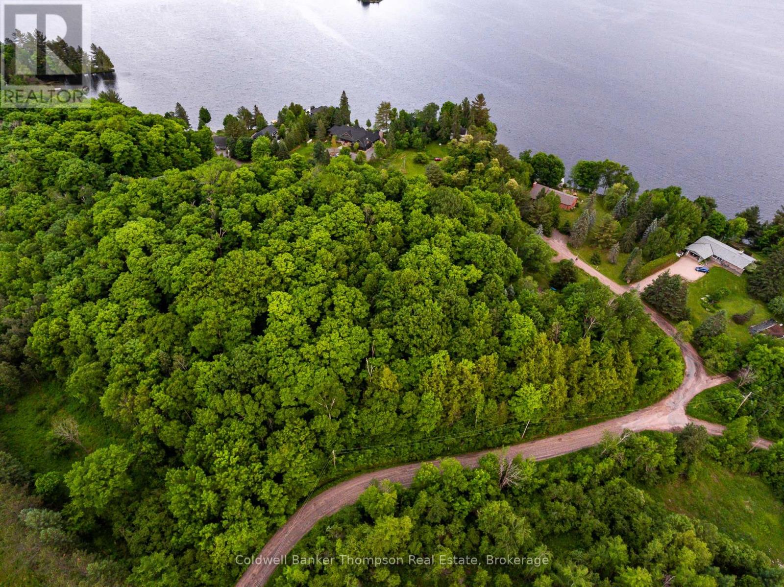 210 Allisons Point Road, Huntsville, Ontario  P1H 1B5 - Photo 1 - X12333095