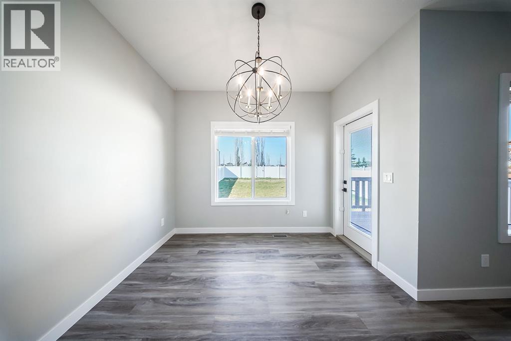 88 Henderson Crescent, Penhold, Alberta  T0M 1R0 - Photo 10 - A2245782