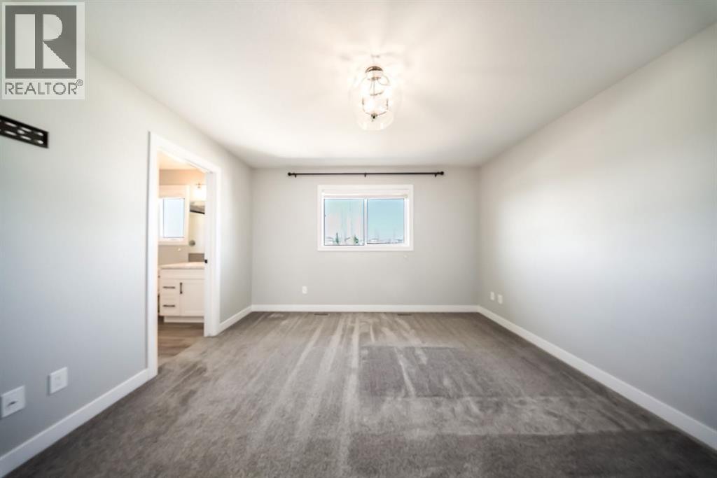 88 Henderson Crescent, Penhold, Alberta  T0M 1R0 - Photo 14 - A2245782
