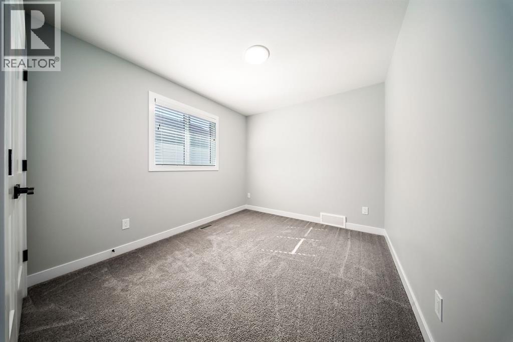 88 Henderson Crescent, Penhold, Alberta  T0M 1R0 - Photo 18 - A2245782