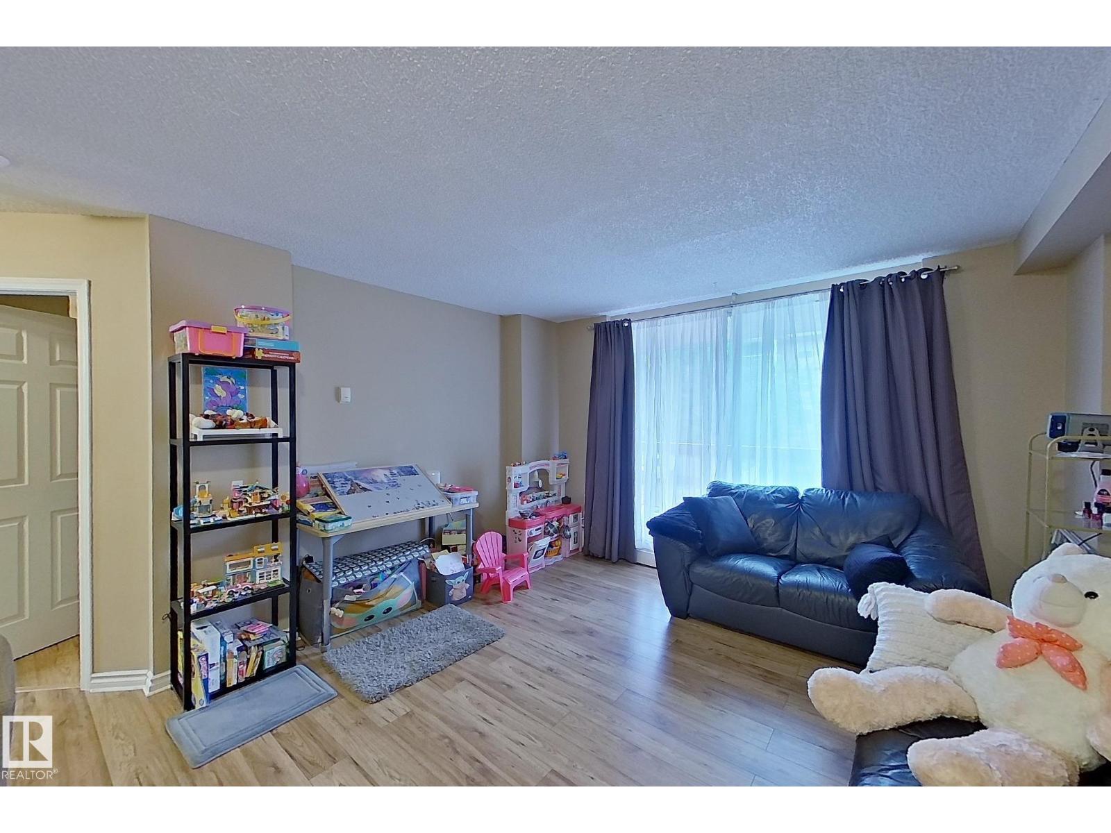 Property at #204 12831 66 ST NW image 2