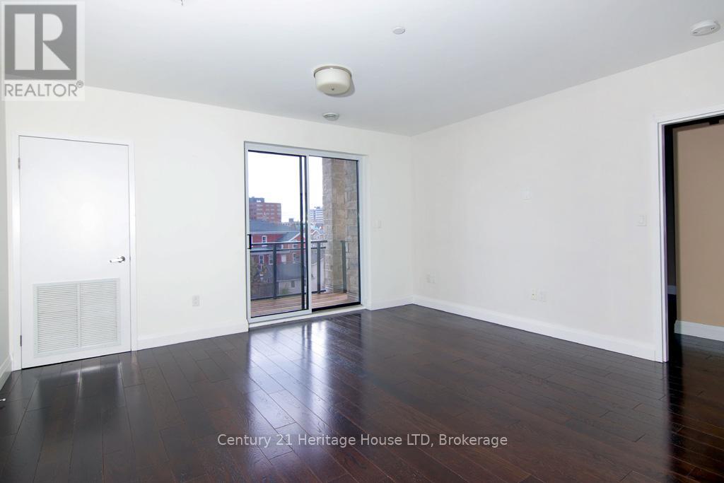 404 - 26 Wellington Street, St. Catharines, Ontario  L2R 5P8 - Photo 11 - X12336003