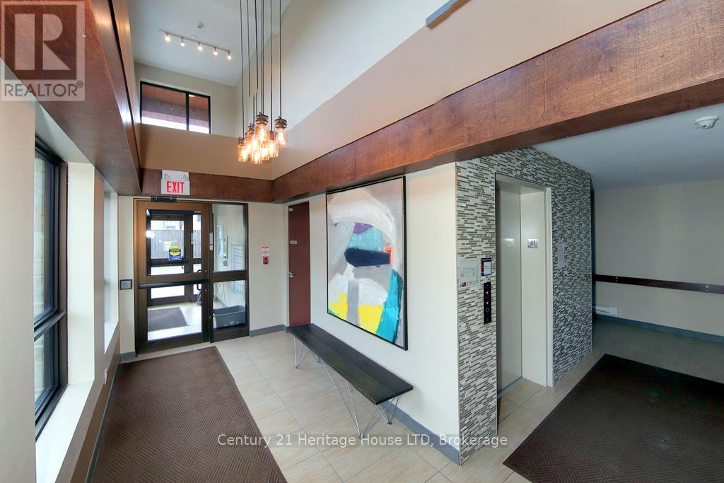 404 - 26 Wellington Street, St. Catharines, Ontario  L2R 5P8 - Photo 3 - X12336003