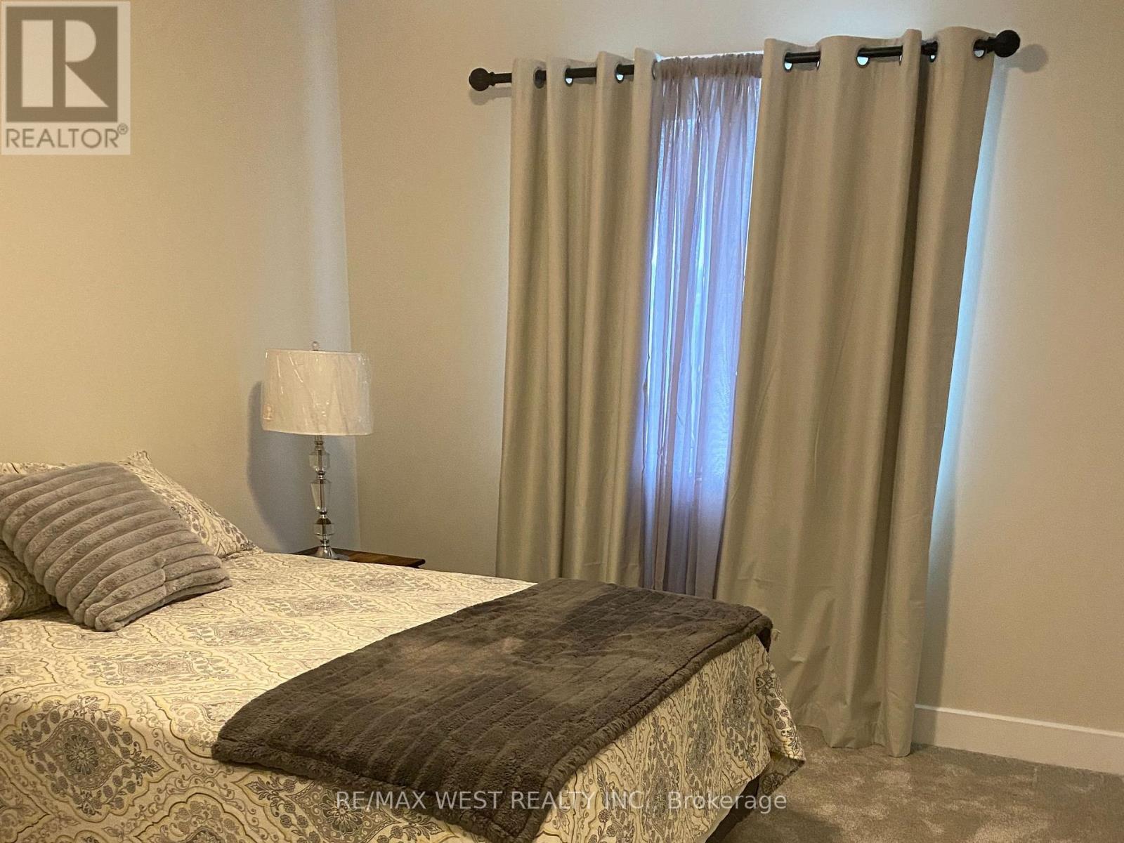 34 Dusenbury Drive, Loyalist, Ontario  K0H 2H0 - Photo 22 - X12335867