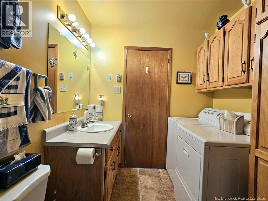 1024 Rue Hache, Beresford, New Brunswick  E8K 1H8 - Photo 44 - NB124624