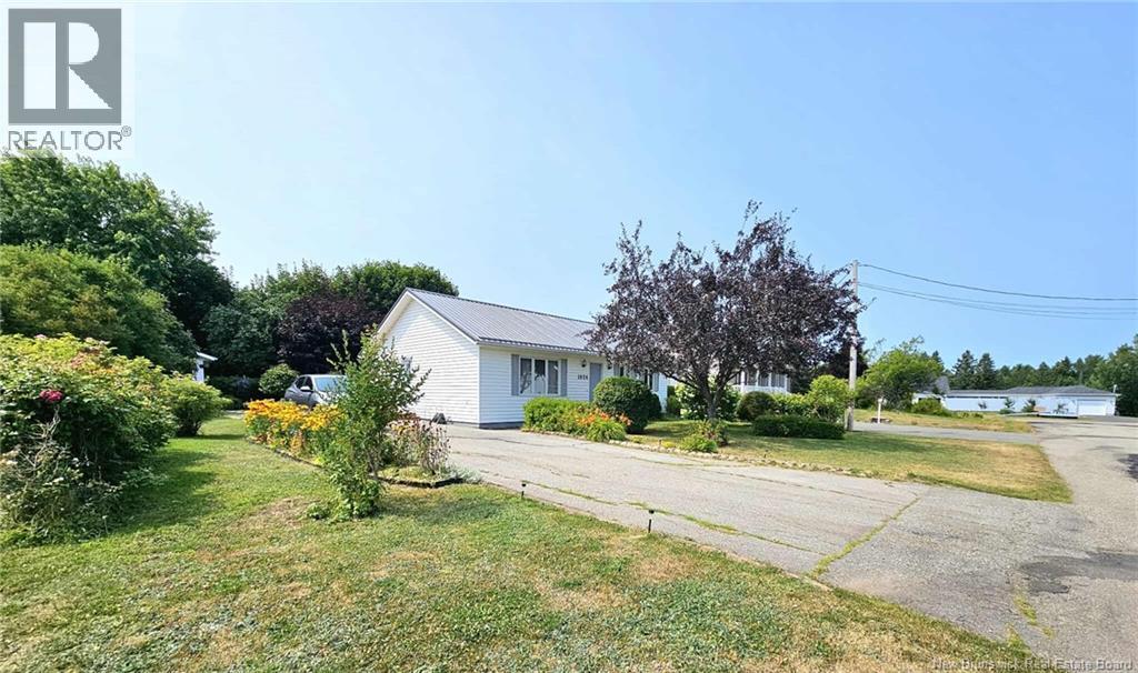 1024 Rue Hache, Beresford, New Brunswick  E8K 1H8 - Photo 24 - NB124624