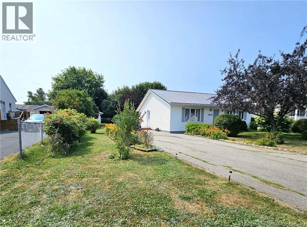 1024 Rue Hache, Beresford, New Brunswick  E8K 1H8 - Photo 2 - NB124624