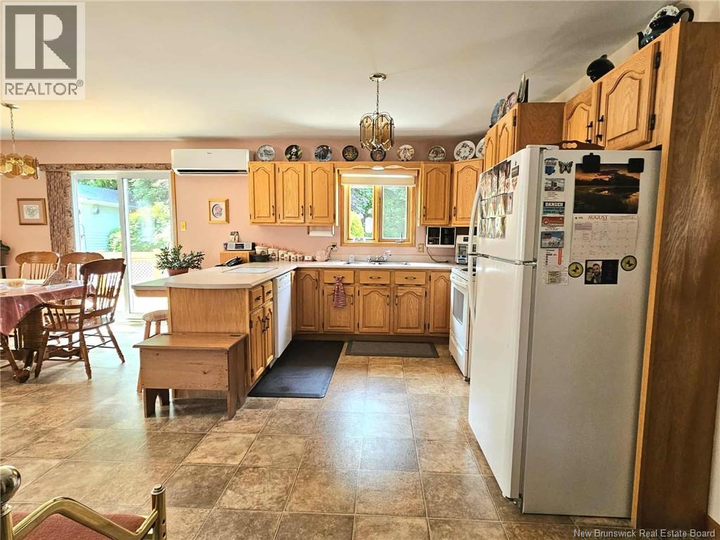 1024 Rue Hache, Beresford, New Brunswick  E8K 1H8 - Photo 36 - NB124624