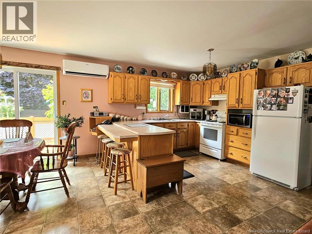 1024 Rue Hache, Beresford, New Brunswick  E8K 1H8 - Photo 29 - NB124624