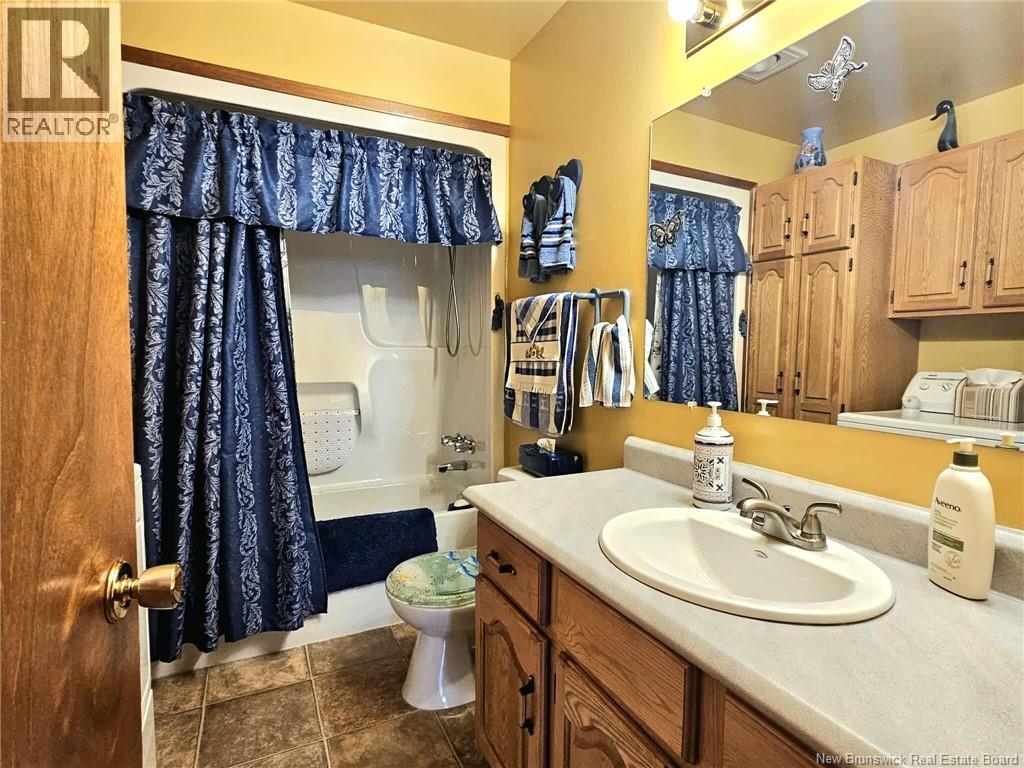 1024 Rue Hache, Beresford, New Brunswick  E8K 1H8 - Photo 45 - NB124624