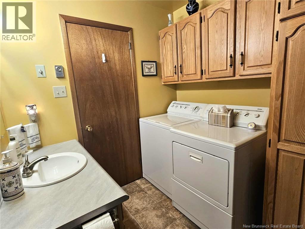 1024 Rue Hache, Beresford, New Brunswick  E8K 1H8 - Photo 46 - NB124624