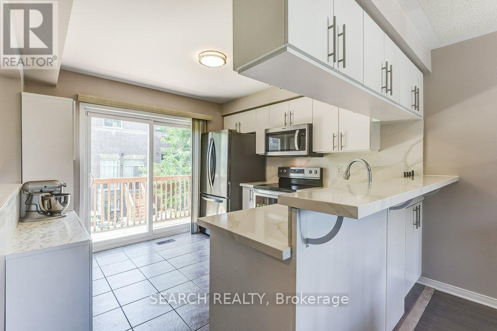 77 - 5535 Glen Erin Drive, Mississauga, Ontario  L5M 6H1 - Photo 9 - W12337324