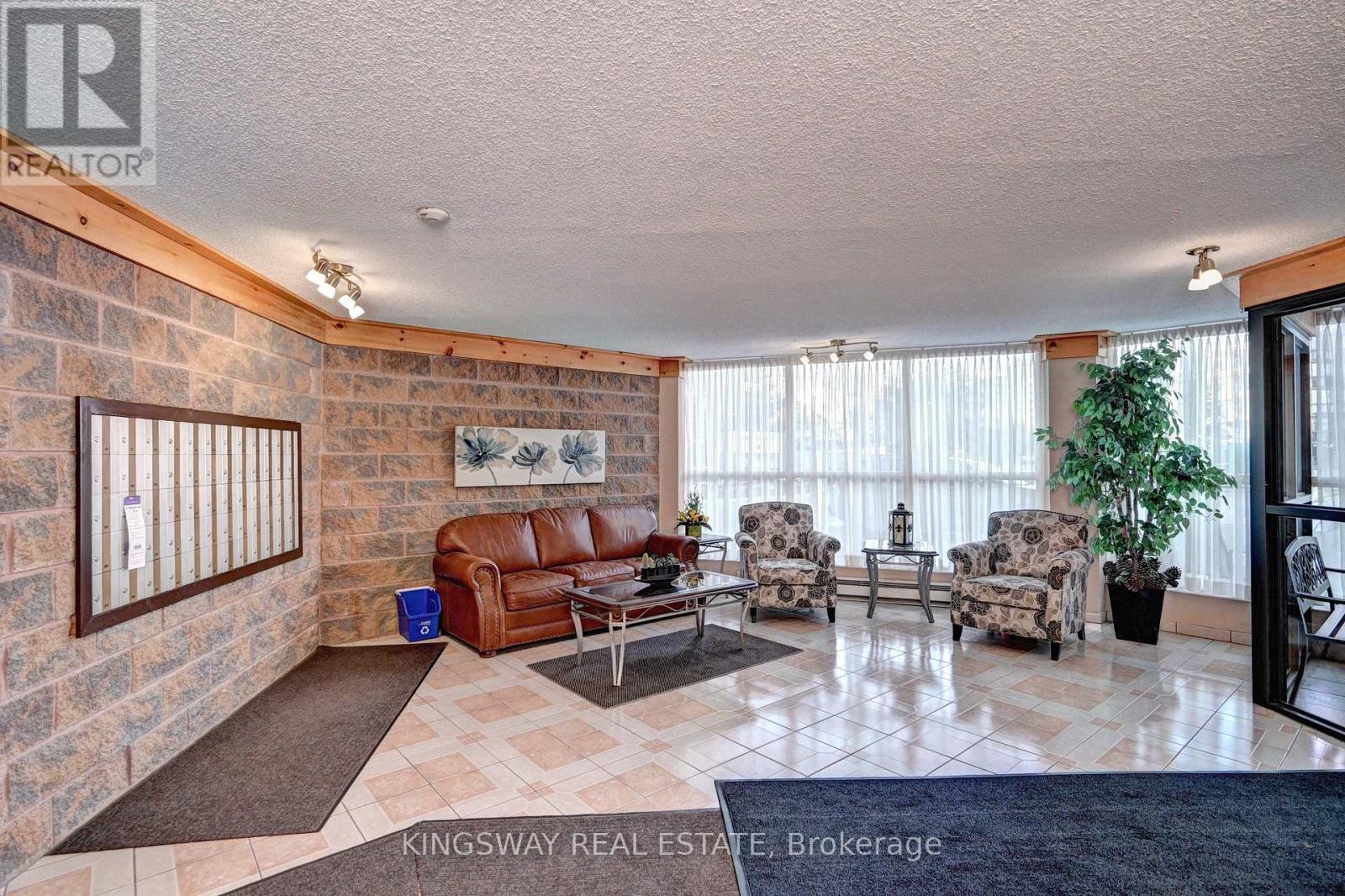 401 - 24 Marilyn Drive N, Guelph, Ontario  N1H 8E9 - Photo 4 - X12337483