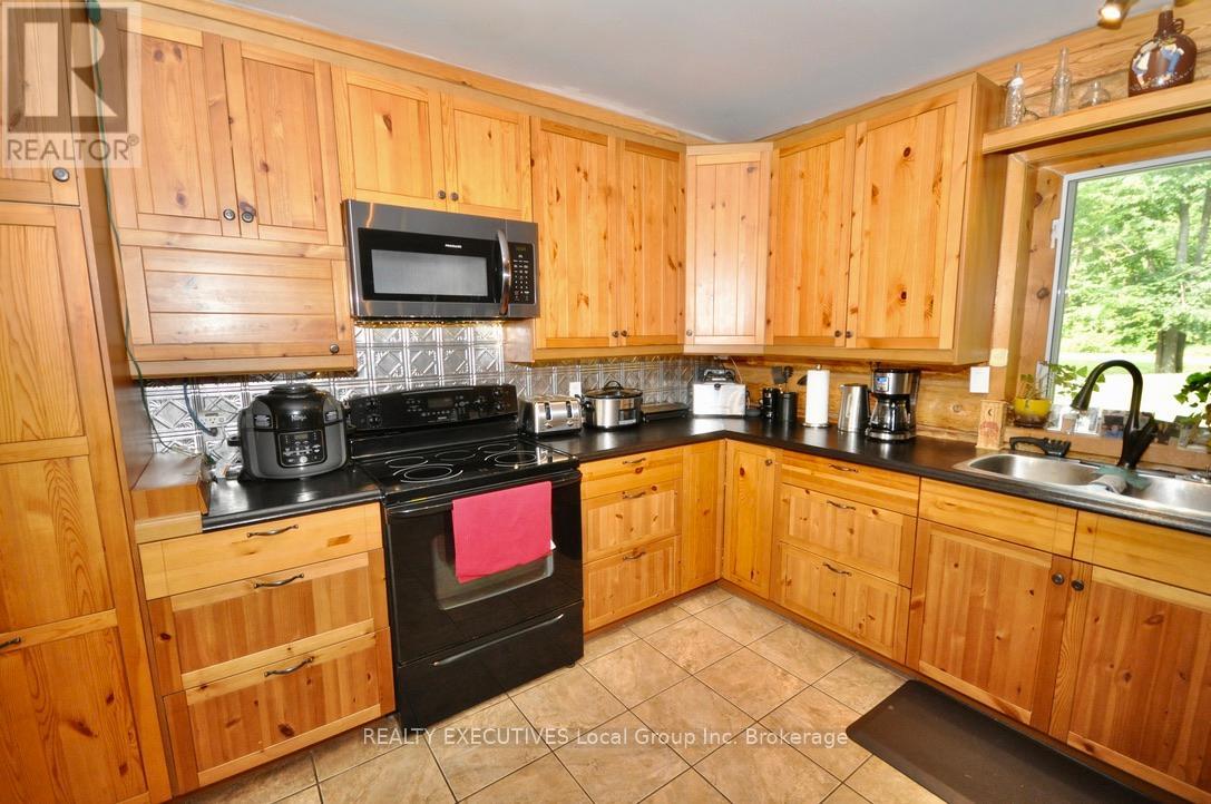 1893 Jocko Point Road, North Bay, Ontario P2B 8G5 - Photo 6 - X12338894