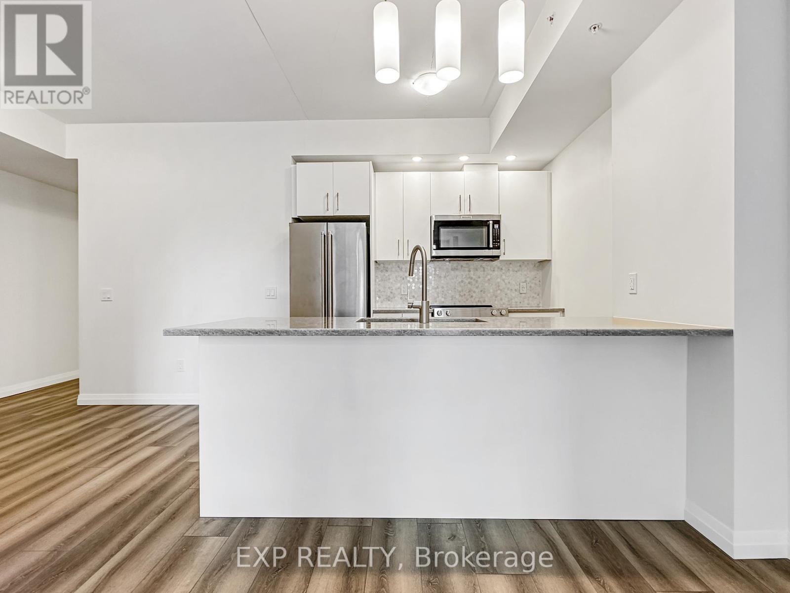 201 - 108 Garment Street, Kitchener, Ontario  N2G 0E3 - Photo 7 - X12339099