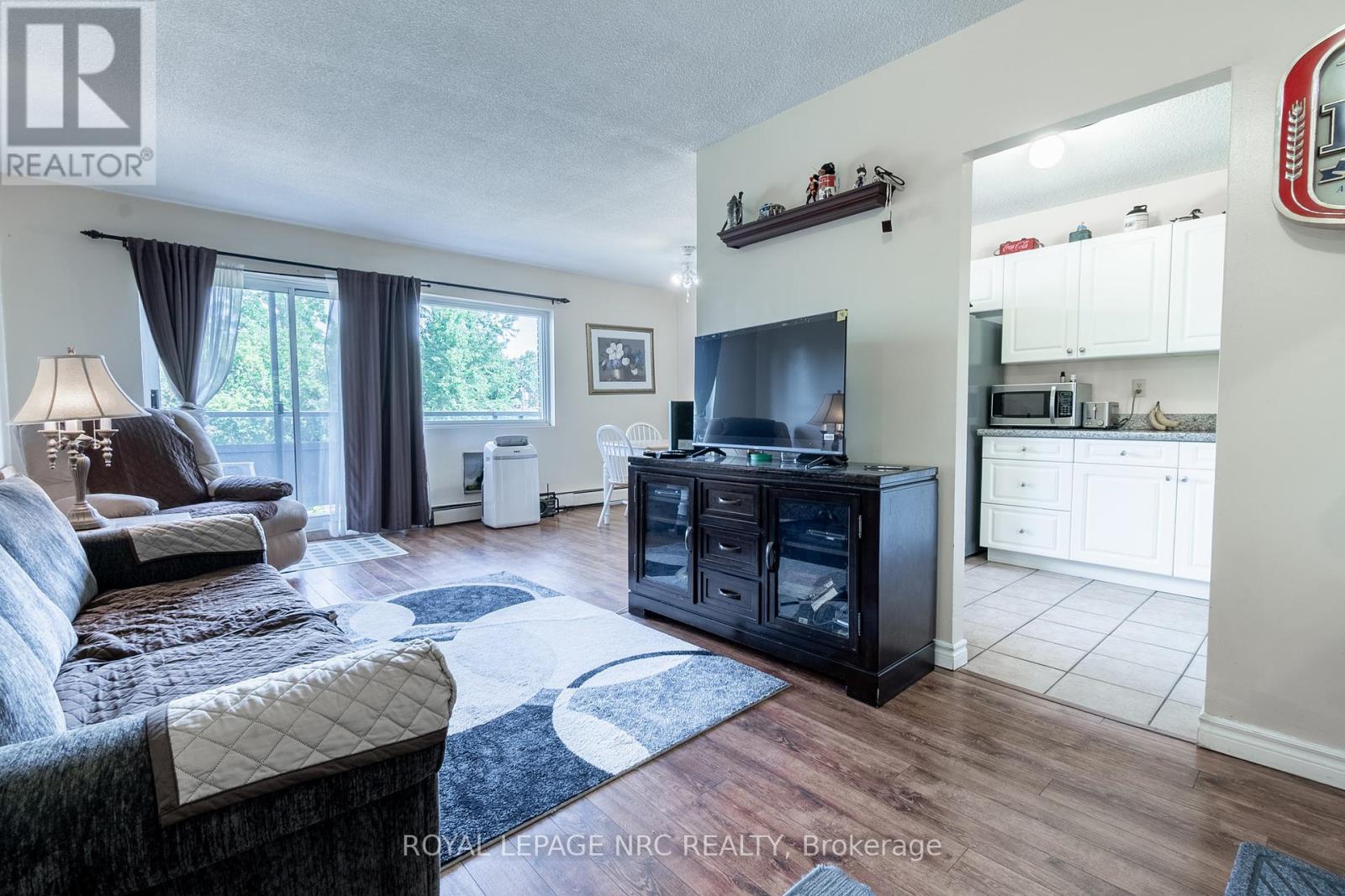 316 - 242 Oakdale Avenue, St. Catharines, Ontario  L2P 3K5 - Photo 1 - X12340871