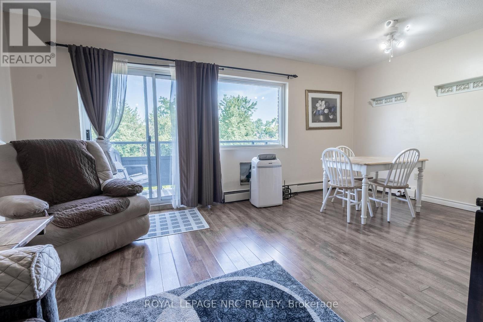 316 - 242 Oakdale Avenue, St. Catharines, Ontario  L2P 3K5 - Photo 3 - X12340871
