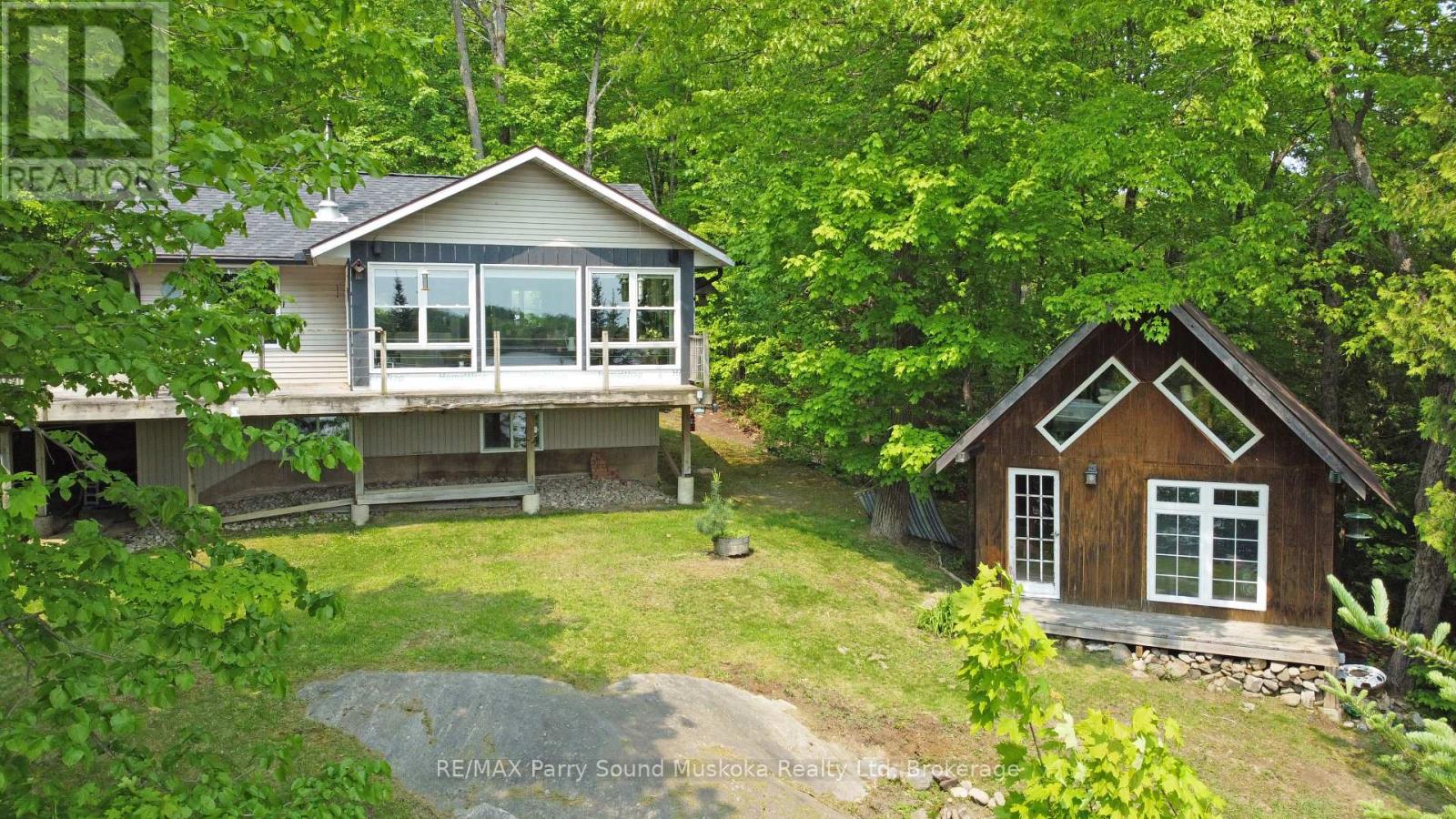 84 Captain Estates Road, Whitestone, Ontario  P0A 1G0 - Photo 2 - X12201349