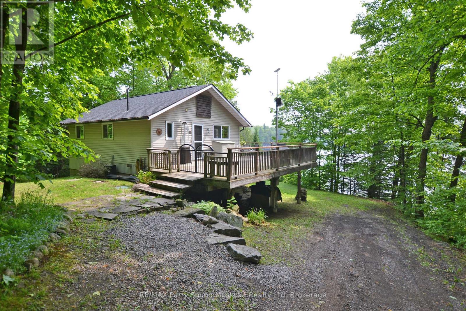 84 Captain Estates Road, Whitestone, Ontario  P0A 1G0 - Photo 3 - X12201349