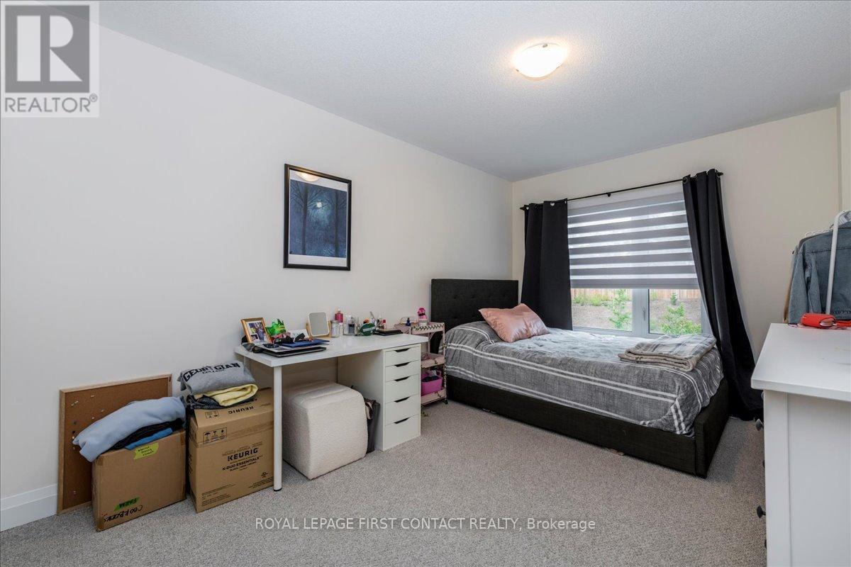 11 Calypso Avenue, Springwater (Midhurst), Ontario  L9X 2E1 - Photo 14 - S12341568