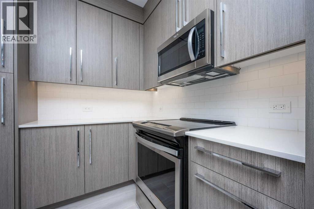 217, 383 Smith Street Nw, Calgary, Alberta  T3B 6J9 - Photo 3 - A2227083