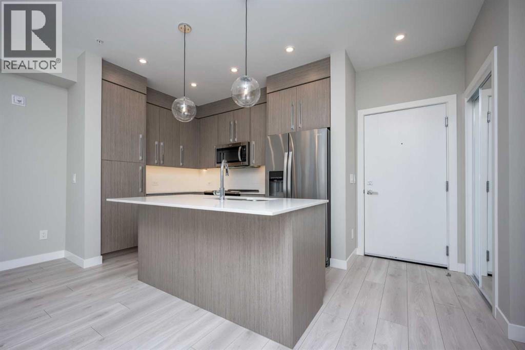 217, 383 Smith Street Nw, Calgary, Alberta  T3B 6J9 - Photo 6 - A2227083