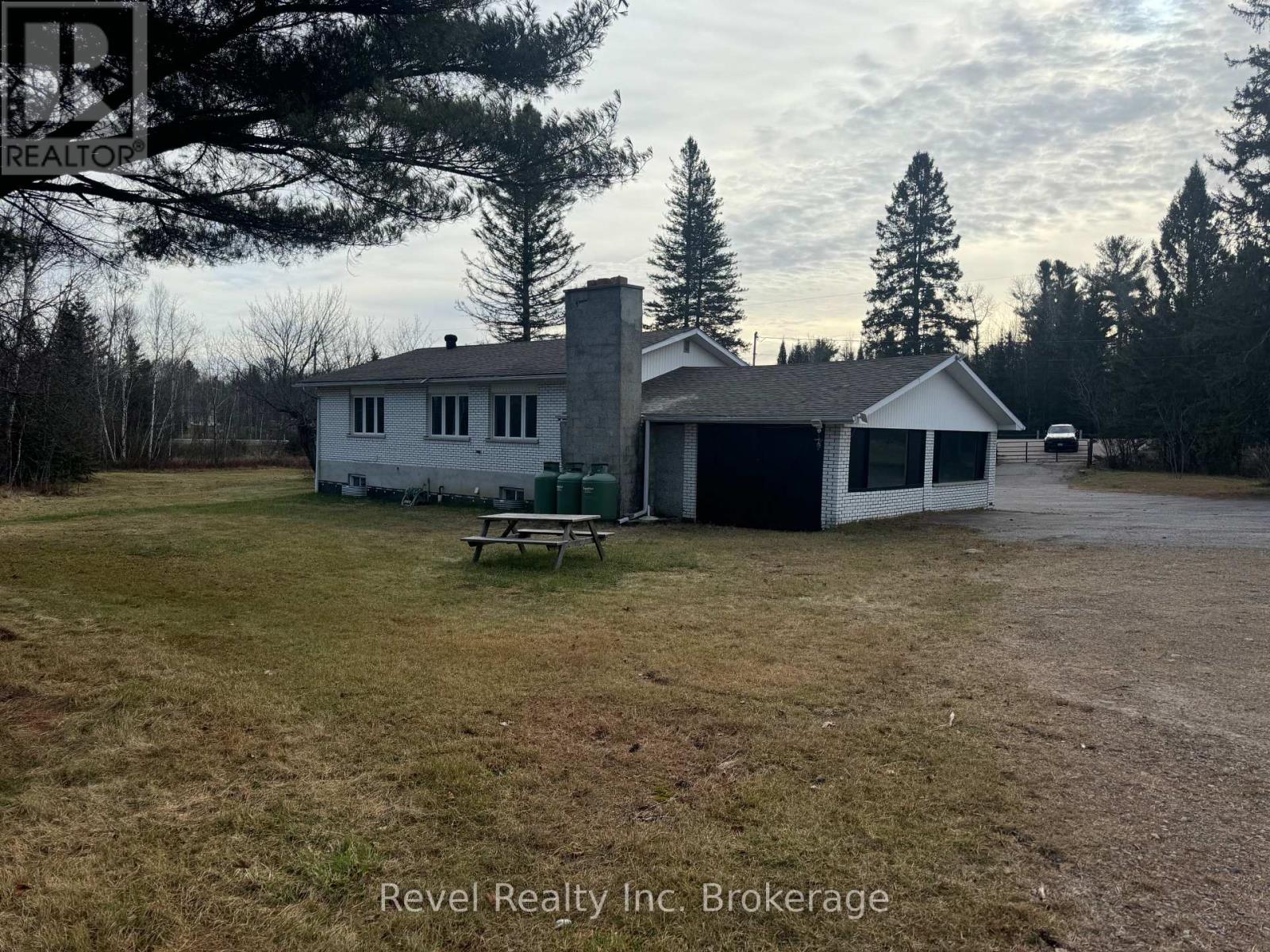 3877 17 Highway E, Papineau-Cameron, Ontario  P0H 1V0 - Photo 1 - X12342309