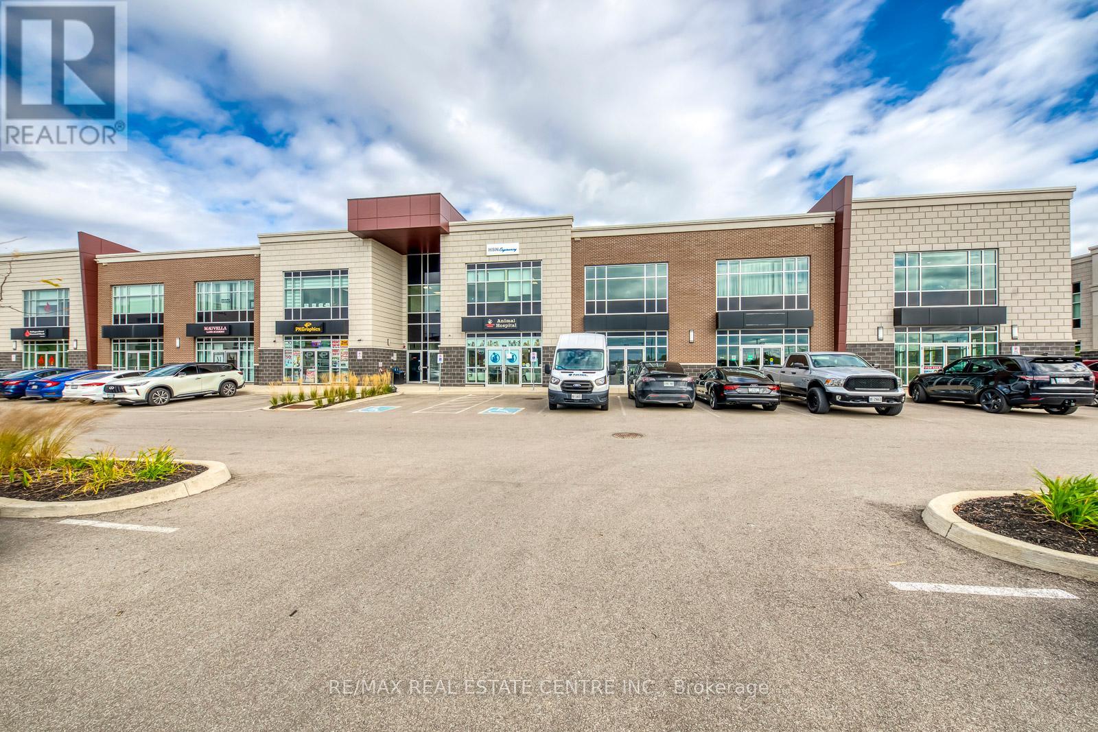 211 - 3475 Rebecca Street, Oakville, Ontario  L6L 0H3 - Photo 2 - W12342624