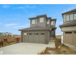1332 11 AV NW Aster