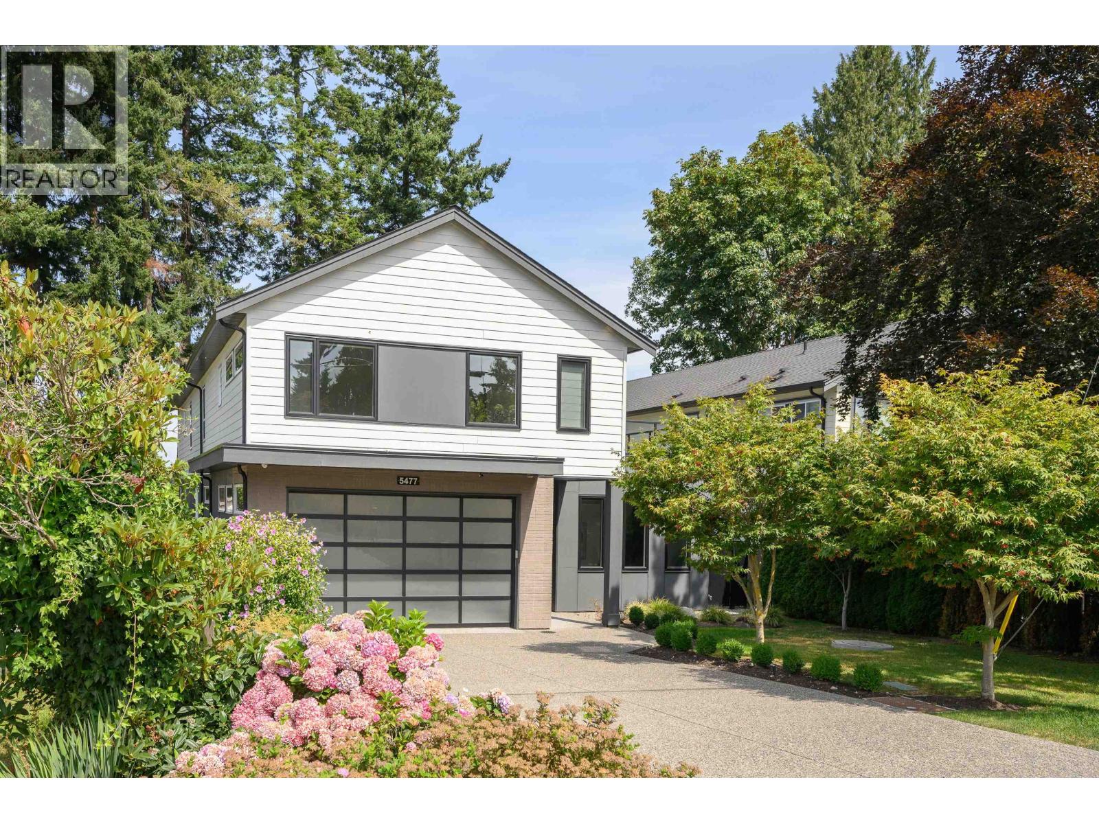 Property at 5477 15B AVENUE image 1