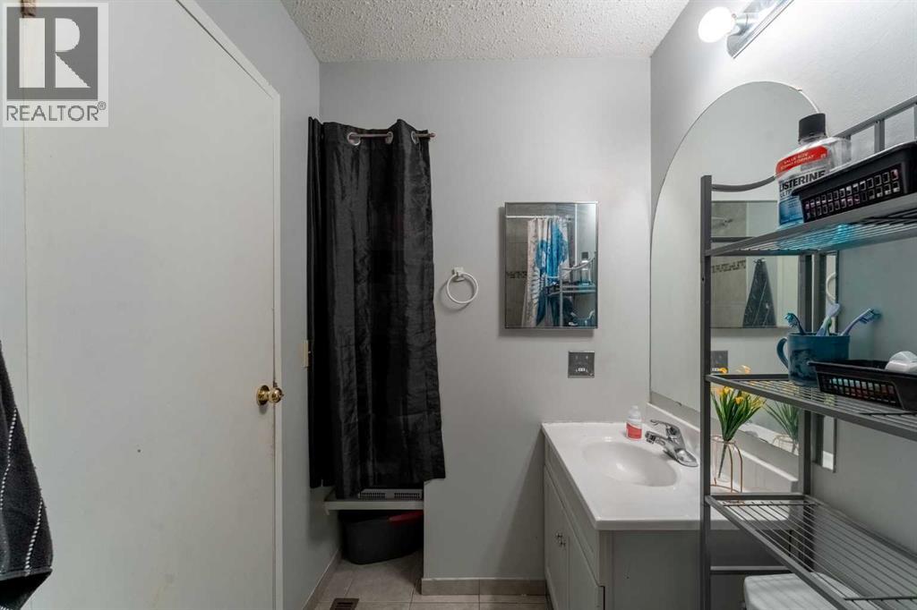 53 Beaconsfield Crescent Nw, Calgary, Alberta  T3K 1W5 - Photo 28 - A2244939