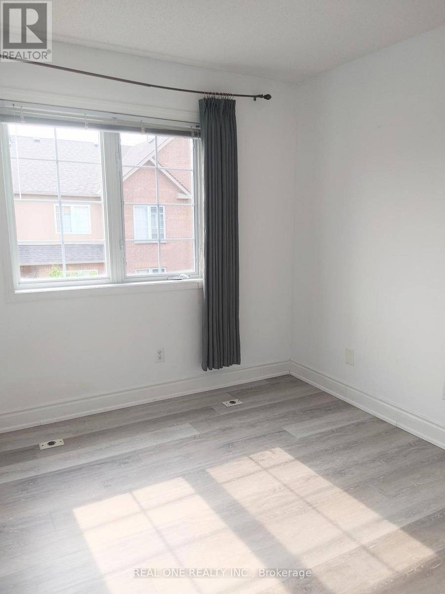 13a - 12 St Moritz Way, Markham, Ontario  L3R 4E8 - Photo 6 - N12343127