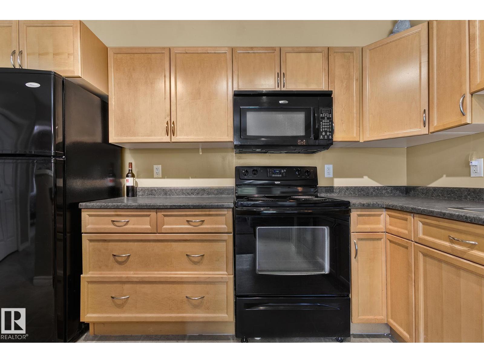 Property at #110 1589 GLASTONBURY BV NW image 3