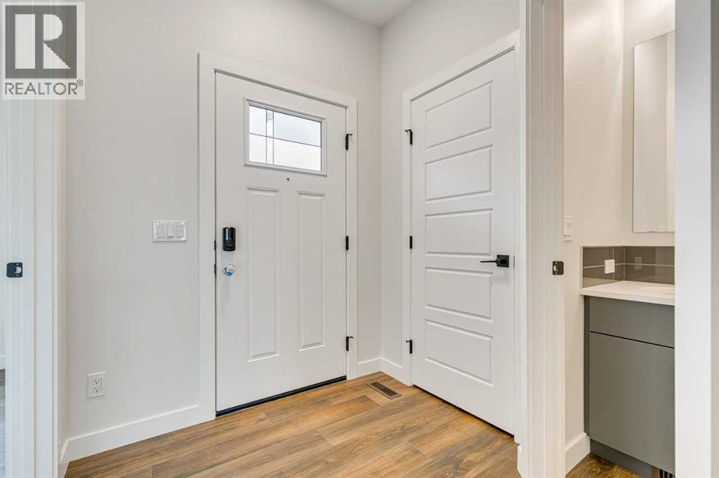 Property at 632 Buffaloberry Manor SE image 5