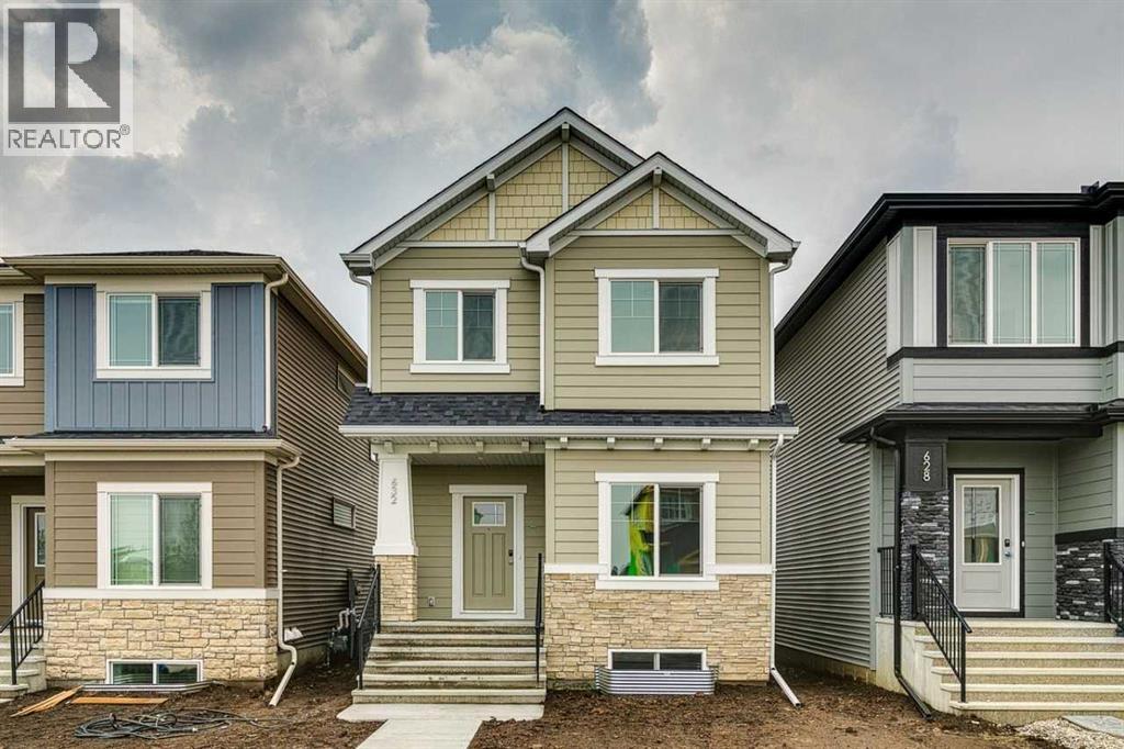 Property at 632 Buffaloberry Manor SE image 1