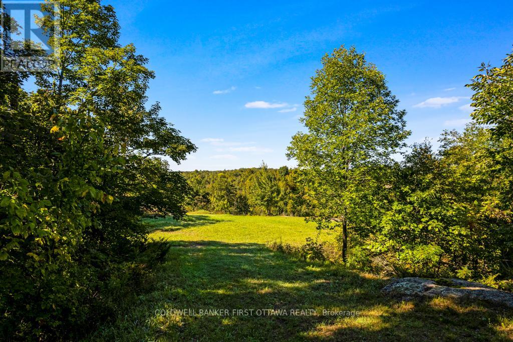 16 Grey Owl Road, Frontenac, Ontario  K0H 2B0 - Photo 4 - X12344281