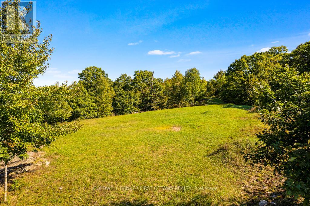 16 Grey Owl Road, Frontenac, Ontario  K0H 2B0 - Photo 5 - X12344281