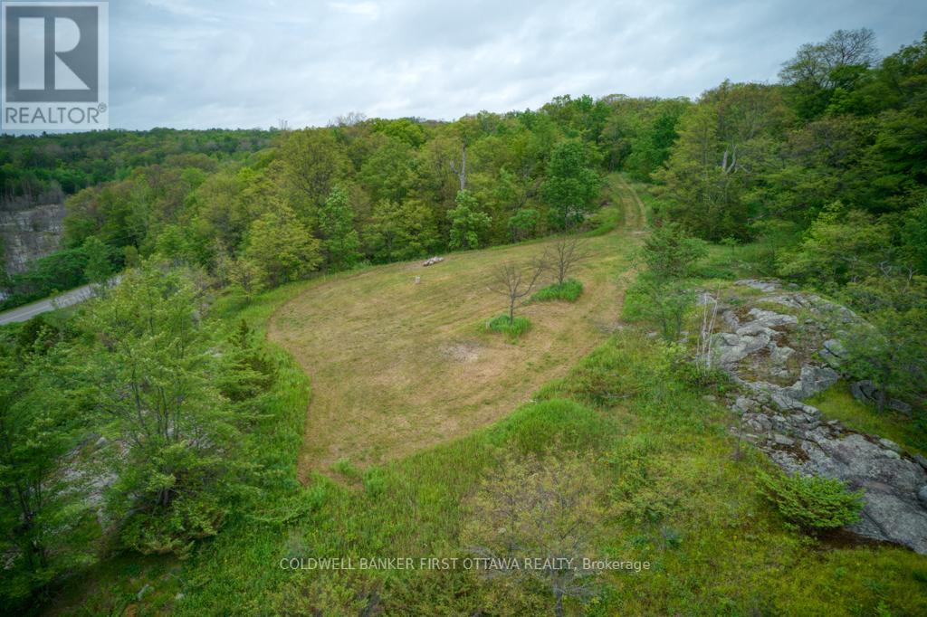 16 Grey Owl Road, Frontenac, Ontario  K0H 2B0 - Photo 6 - X12344281