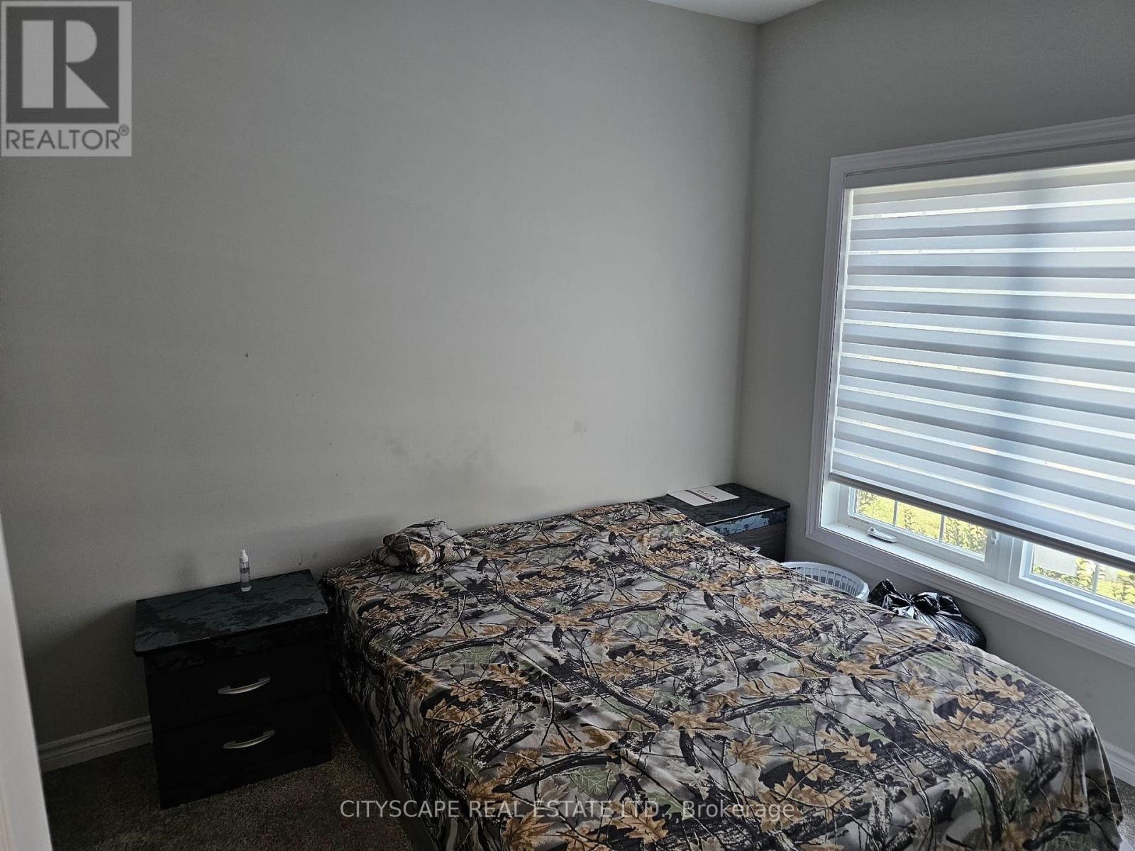 25 Braida Lane, Halton Hills (Ac Acton), Ontario  L7J 0B7 - Photo 6 - W12344197