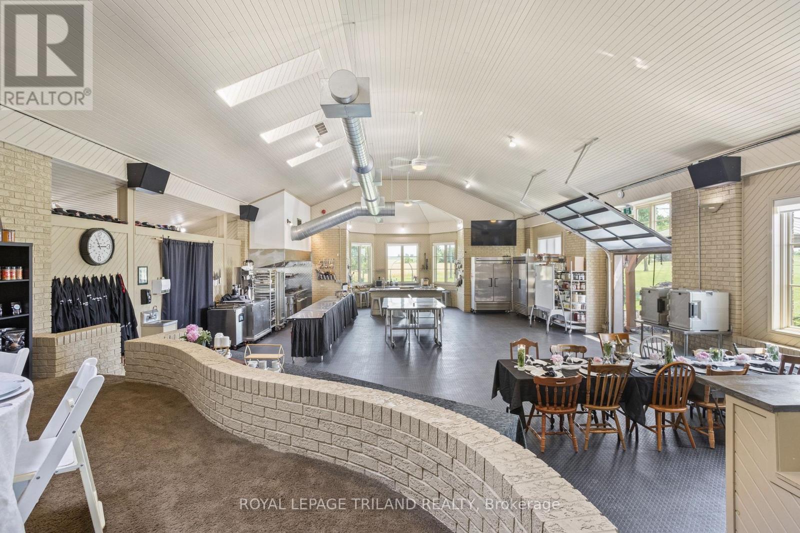 29830  Centre Road  Adelaide Metcalfe, Ontario The Chef's Estate - A Signature Culinary Destination & Luxury Business Opportunity where visionary Hospitality meets Elevated Country Living. Perfectly situated with direct highway access, travel from Toronto, London, Hamilton, and even the US border is effortless - making this the ideal base for a destination retreat, culinary venue, or private branded estate.  Welcome to the Chef's Estate - an extraordinary, one-of-a-kind property blending luxury living with high performance business infrastructure on a tranquil gardened lawn just under 4 acre setting. Designed for chefs, entrepreneurs, even hosts, and lifestyle investors, this estate is a fully turnkey opportunity. Step into unparalleled sophistication with this magnificent 12,000 square foot luxury mansion, where timeless elegance meets modern sustainability. Boasting 4 expansive bedrooms including a main level primary and an impressive 9 bathrooms, every inch of this estate is designed with opulence and comfort in mind. From grand living spaces to finely crafted architectural details, the home offers an atmosphere of refined luxury. What sets this residence apart is its state-of-the-art geothermal heating and cooling system - an environmentally conscious and cost effective solution that ensures year round comfort without compromising on performance. This exquisite estate is a rare blend of grandeur and green innovation, redefining luxury living for the modern age. In the main residence, you'll find a luxurious kitchen outfitted for gourmet daily living, alongside a second fully equipped kitchen on the walk out lower level, perfect for multi generational living, catering prep, or just relax in the massive private theatre and game room. At the heart of the property is a commercial grade culinary kitchen, fully licensed by the LCBO, and equipped for upscale chef led events, private dinners, workshops, and content creation. Top of the line appliance, such as Dacor, Sub Zero and Blue Star. Come and see! (id:48254)