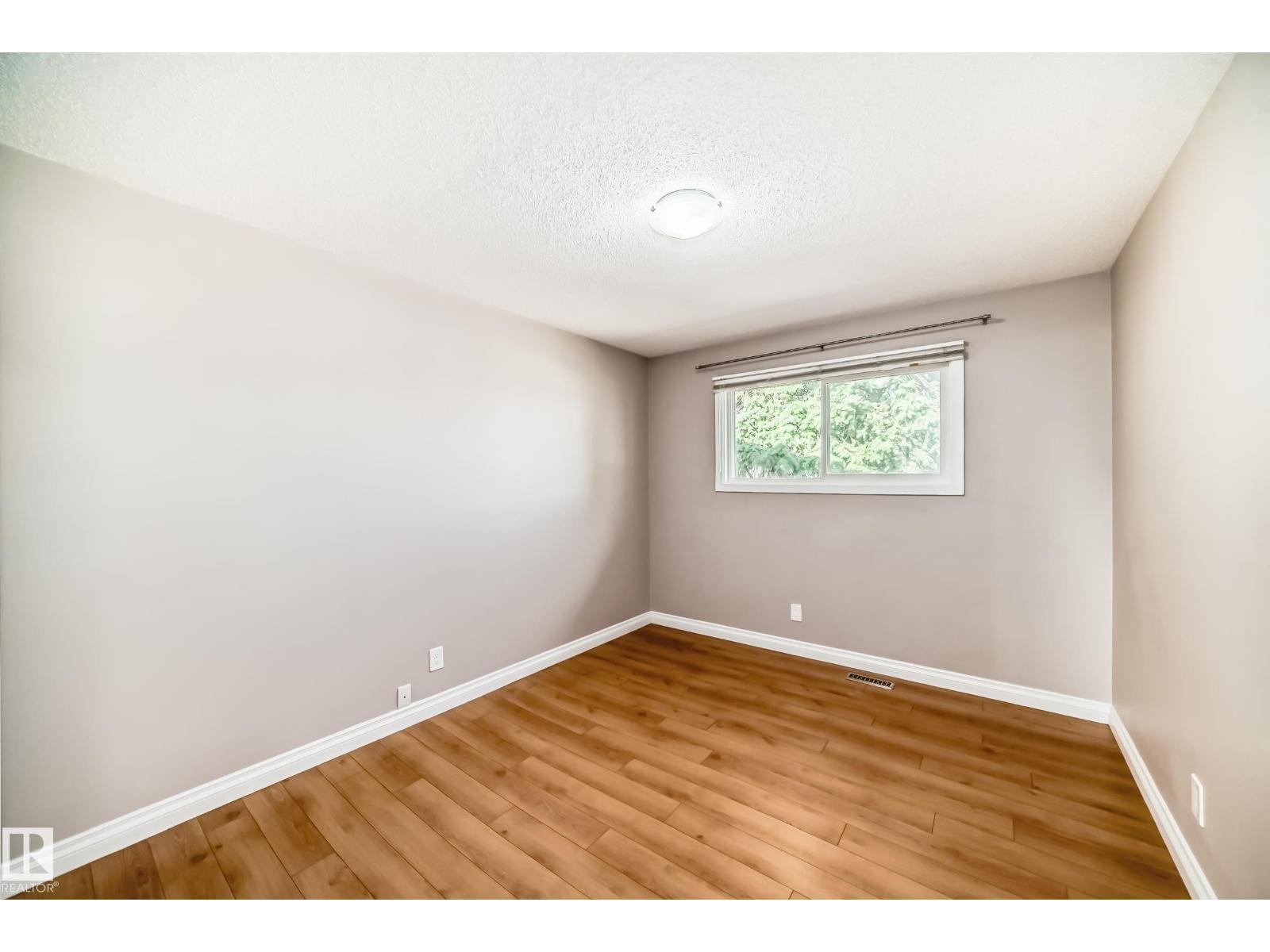 Property at 7703/7705 73 ST NW image 2
