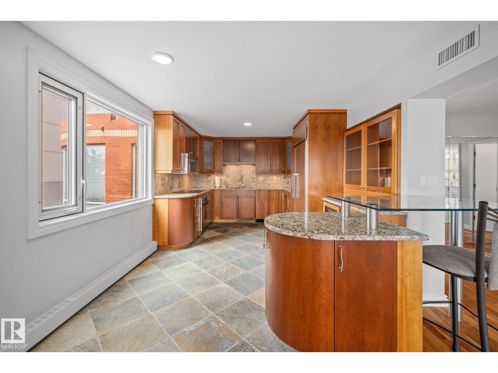 Property at #202 10010 119 ST NW image 4