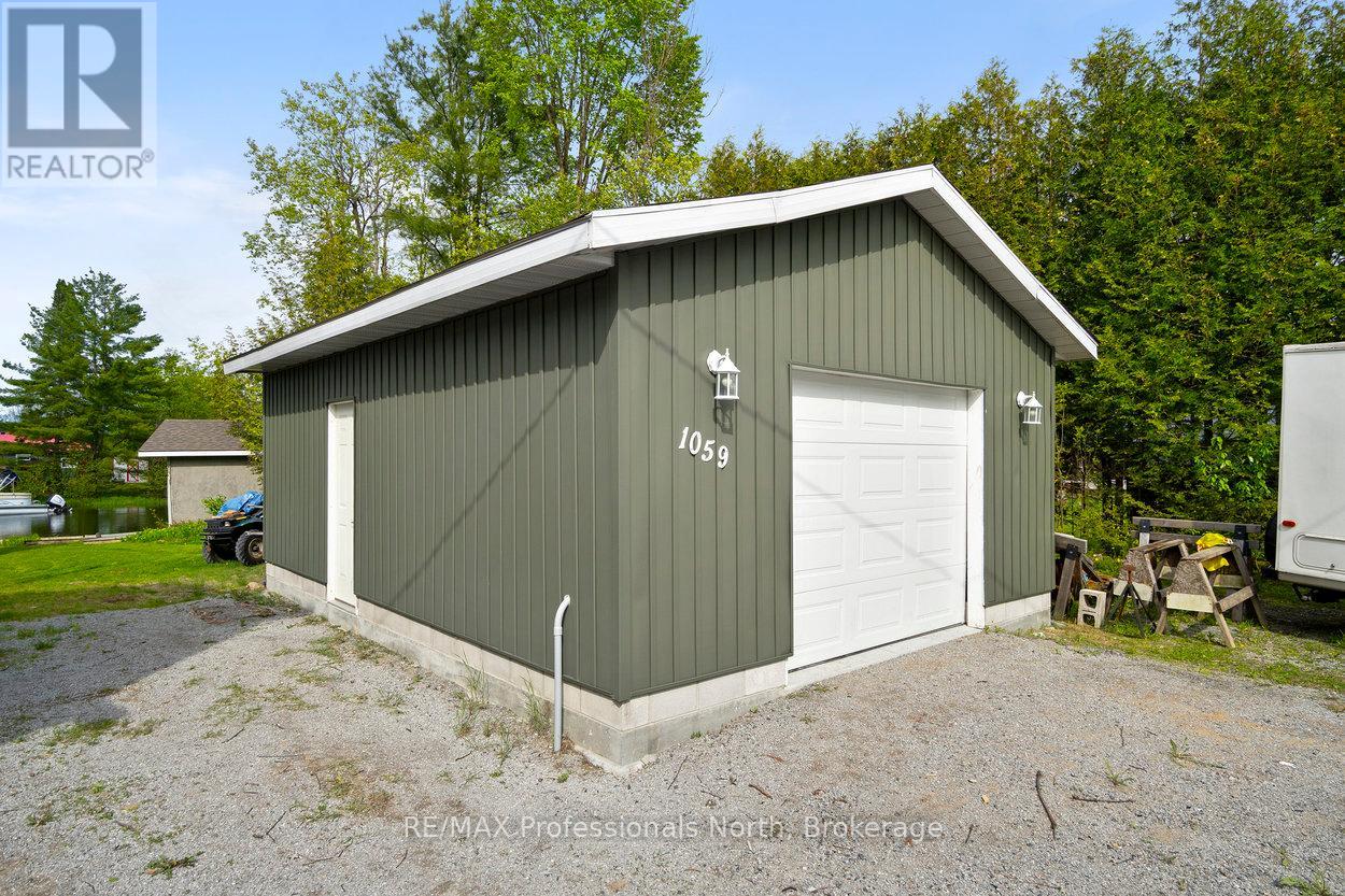 1059 Tiffany Lane, Minden Hills, Ontario  K0M 2K0 - Photo 15 - X12346490