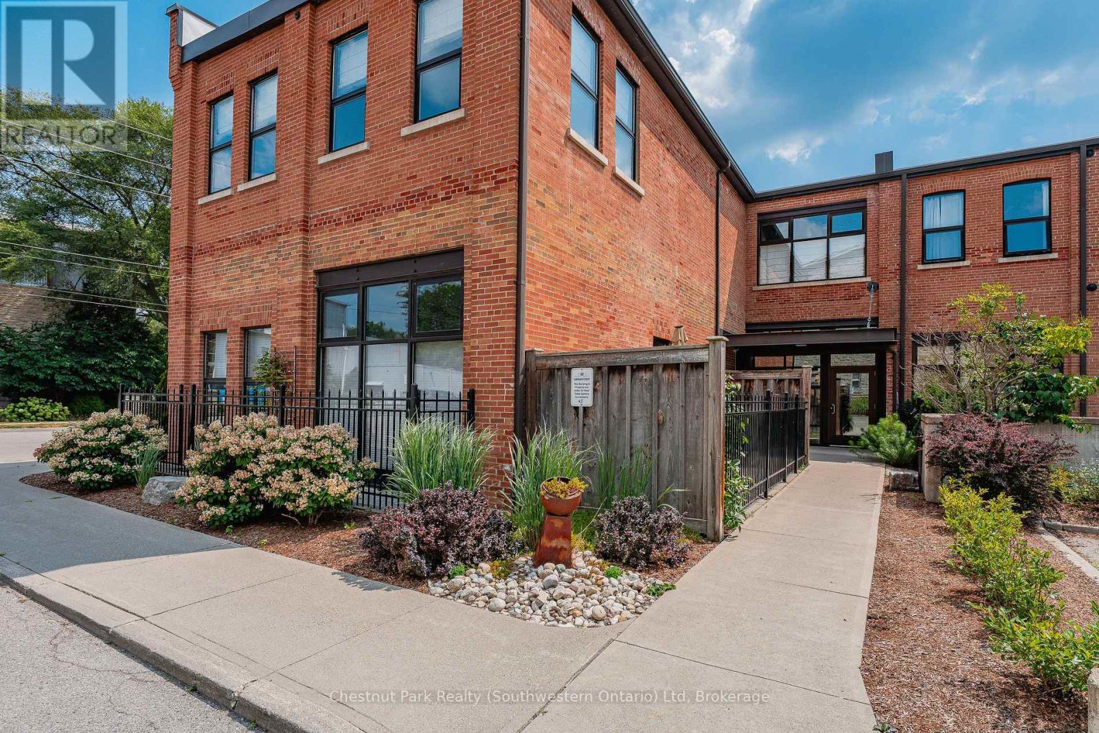 106 - 60 Cardigan Street, Guelph, Ontario  N1H 3Z6 - Photo 2 - X12346548
