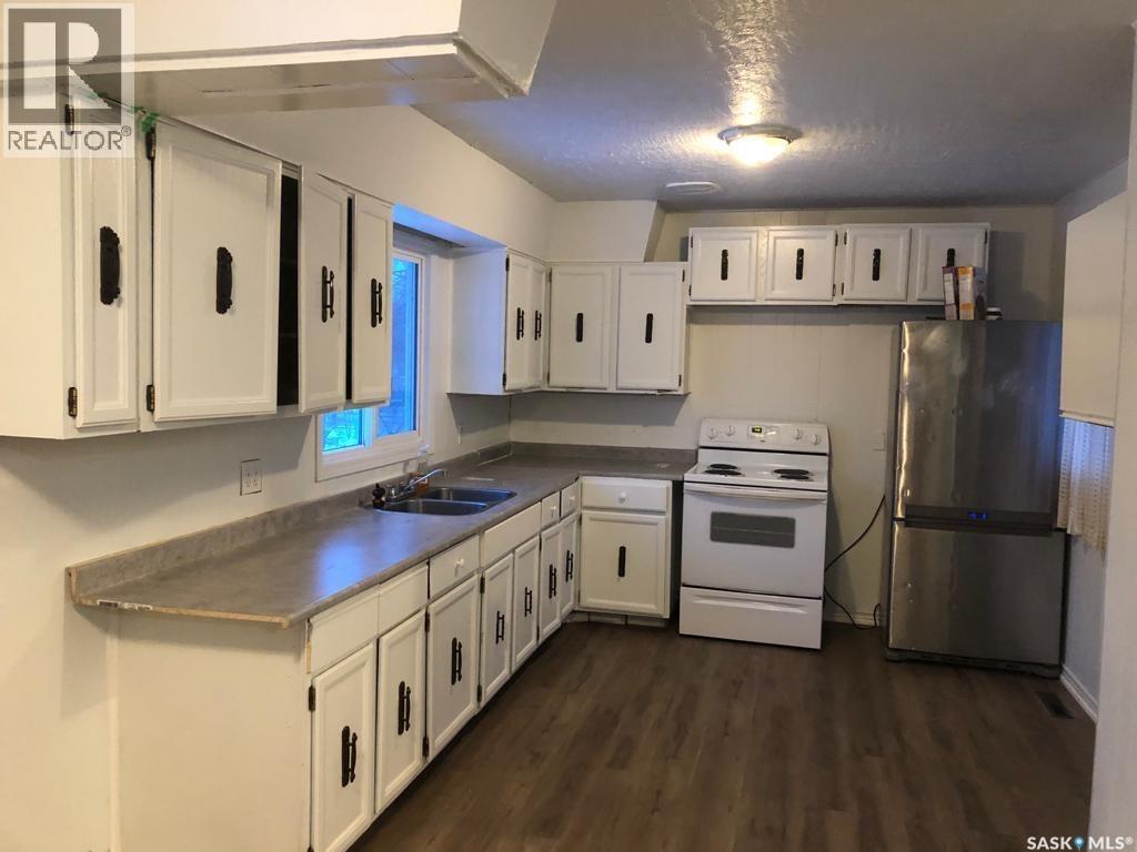 128 S Avenue S, Saskatoon, Saskatchewan  S7M 2Z6 - Photo 1 - SK005546