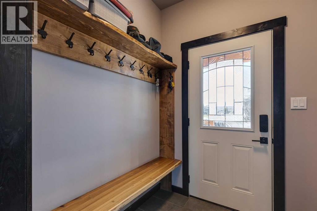 216 Cottageclub Crescent, Rural Rocky View County, Alberta  T4C 1B1 - Photo 2 - A2248971
