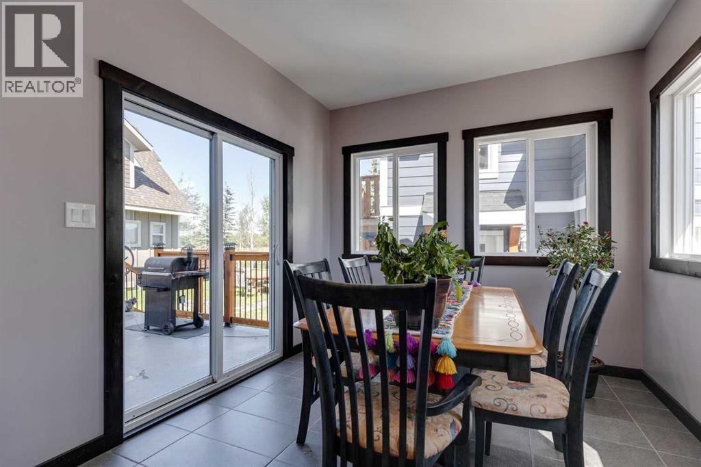 216 Cottageclub Crescent, Rural Rocky View County, Alberta  T4C 1B1 - Photo 6 - A2248971