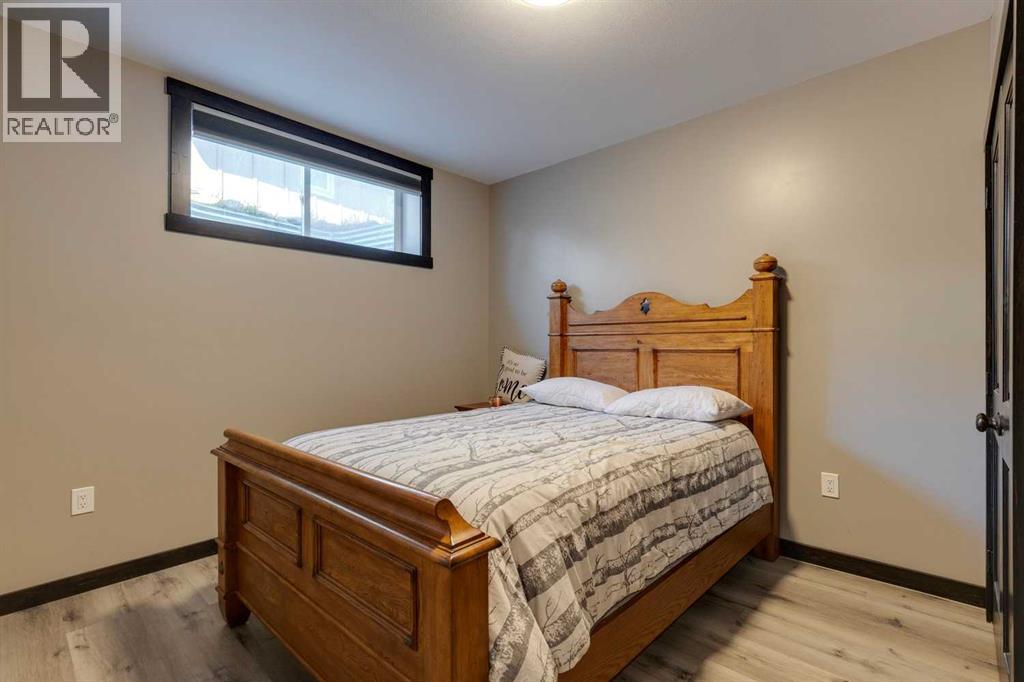 216 Cottageclub Crescent, Rural Rocky View County, Alberta  T4C 1B1 - Photo 21 - A2248971